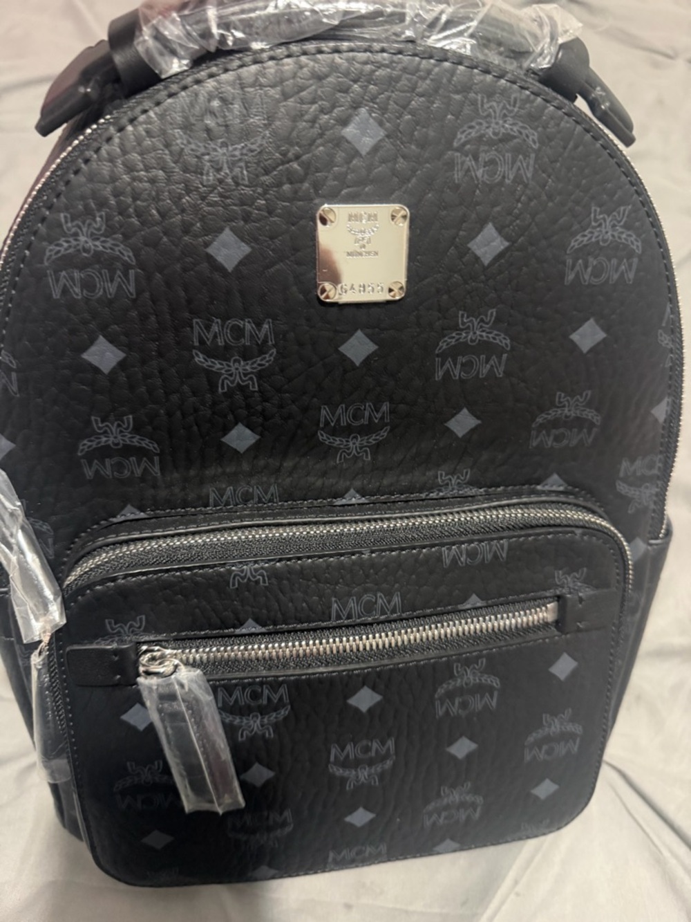 MCM Black Monogrammed Mini Backpack with Silver Hardware